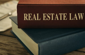 book that read real estate law on spine